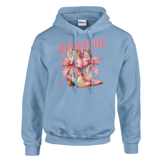 Pastel blue women's cowgirl hoodie featuring pink bow-tied boots and COWGIRL text graphic.