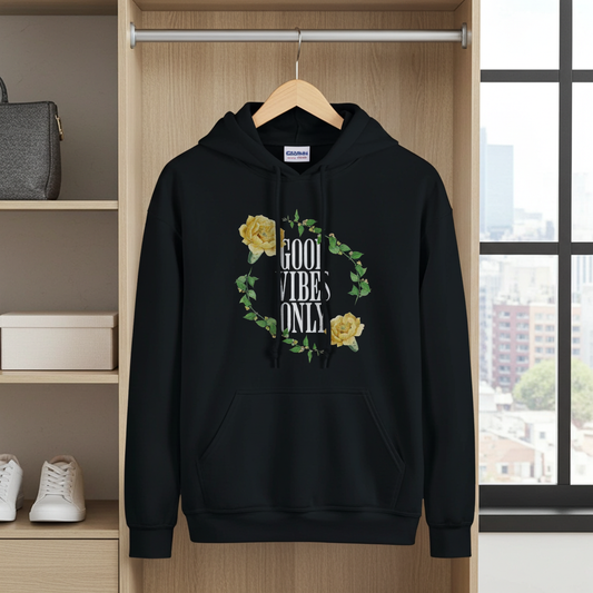 Black hoodie with floral design and 'Good Vibes Only' text on a hanger.