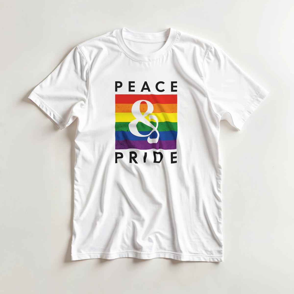 White women's short-sleeve T-shirt with rainbow Pride flag square and Peace & Pride text.