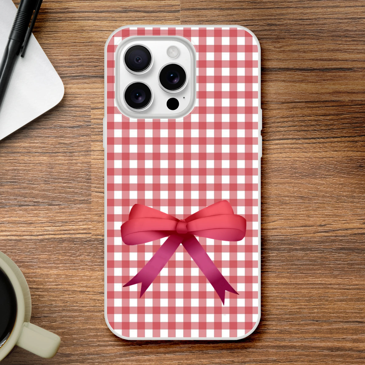 Red gingham bow iPhone case (13–16), Cute Coquette aesthetic, slim protective cover with a pink bow.
