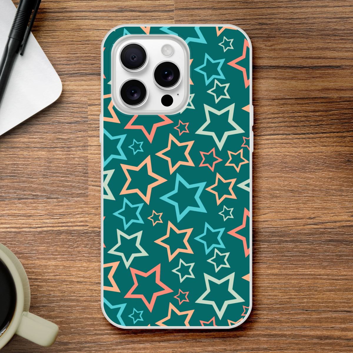 Retro multicolour star iPhone case (13-16) with Y2K aesthetic teal star print, protects against bumps.