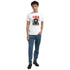 Male model in white JDM graphic T-shirt with car artwork and red 81, soft cotton blend, paired with blue jeans.