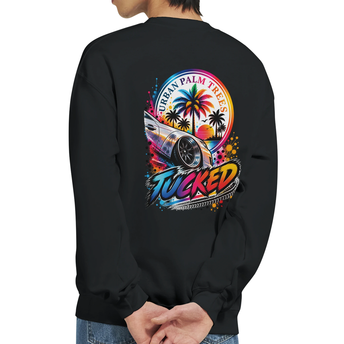Black sweatshirt back featuring colorful "Tucked" graphic with lowered car, palm trees, and Urban Palm Trees text for petrolhead streetwear.