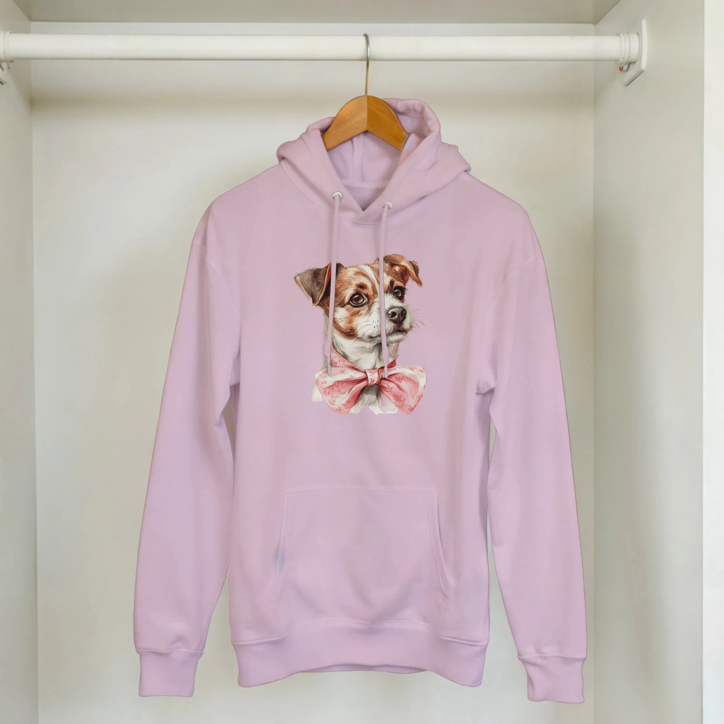 Lavender hoodie with cute dog graphic wearing a pink bow tie and front pouch pocket.