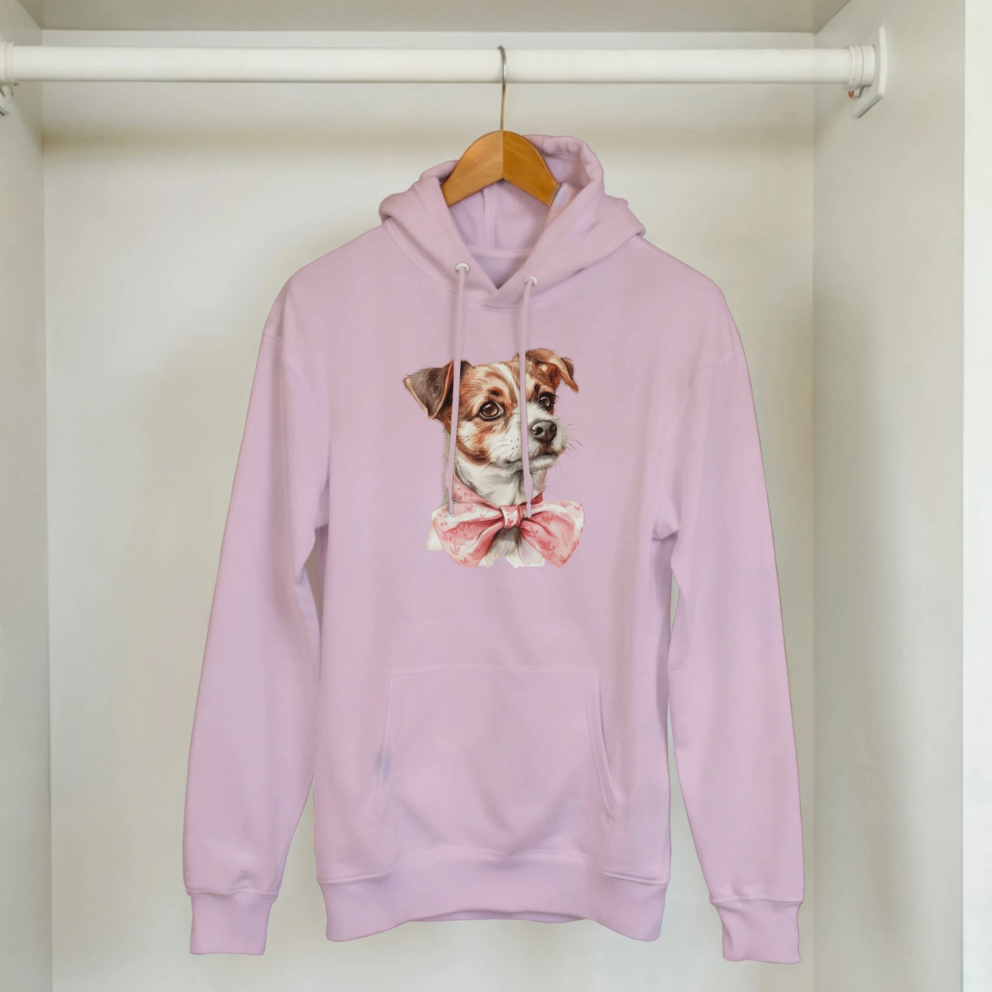 Lavender hoodie with cute dog graphic wearing a pink bow tie and front pouch pocket.