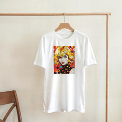 White men's 70s pop-art girl T-shirt on a wooden hanger, bold retro psychedelic streetwear graphic.