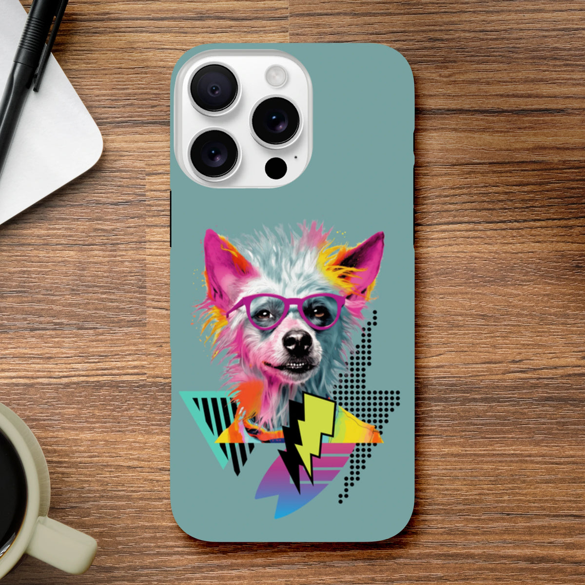 Retro pop art iPhone case featuring a colorful dog in pink glasses with geometric lightning bolts on a teal background.