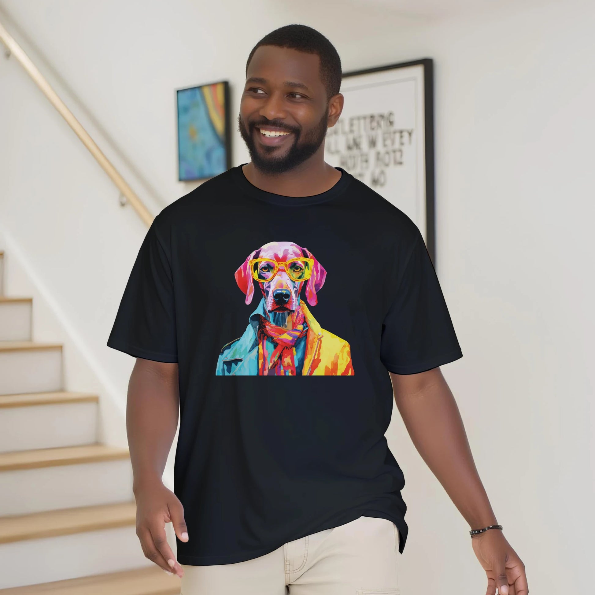 Man wearing Gent Dog T Shirt, a soft cotton blend black tee with a colorful dog graphic wearing glasses.