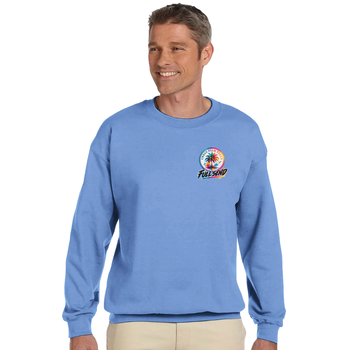 Blue sweatshirt featuring Urban Palm Trees Full Send logo with colorful palm tree graphic on chest.