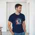 Man wearing navy USA graphic T-shirt featuring Statue of Liberty design for Independence Day.