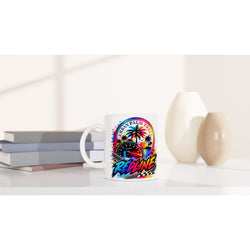 Redline Petrolhead Mug featuring a colorful speedometer, palm trees, and checkered flag design for car enthusiasts.