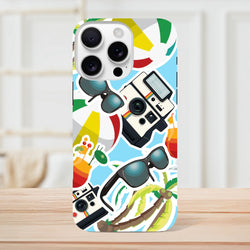 Vibrant blue iPhone case featuring a summer sticker effect design with palm trees, vintage cameras, sunglasses, and cocktails.