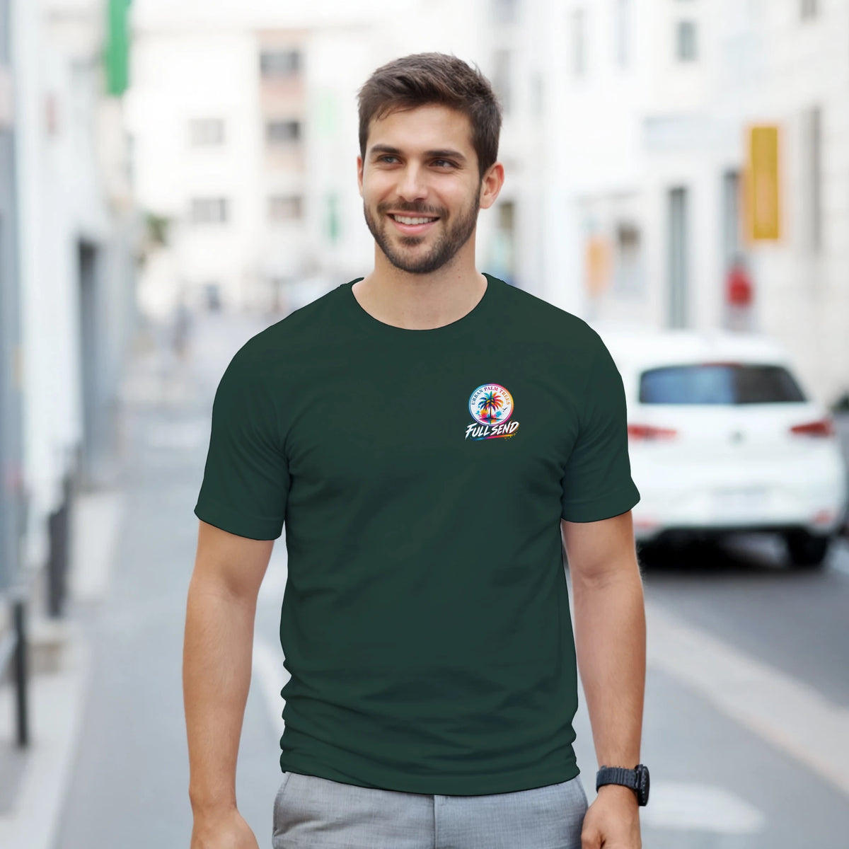 Man wearing dark green "Full Send" graphic tee with palm tree logo. Modified car culture streetwear for petrolheads.