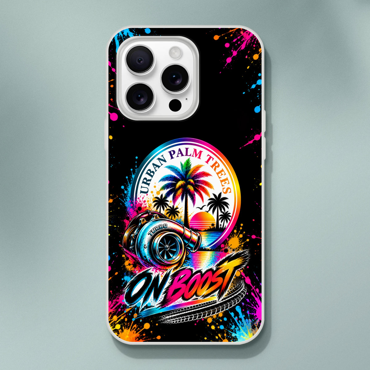 Colorful "On Boost" iPhone case featuring a turbocharger, palm trees, and paint splatter art against a black background.