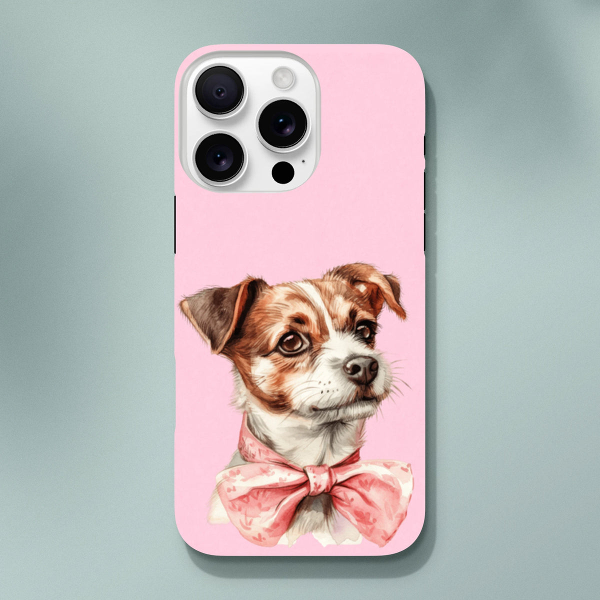 Pink tough iPhone case featuring a cute dog illustration wearing a floral bow tie. Shock-absorbent phone cover for city use.