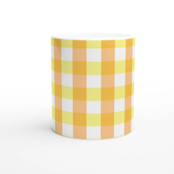 Yellow gingham ceramic mug with a cute checkered pattern for coffee or tea.