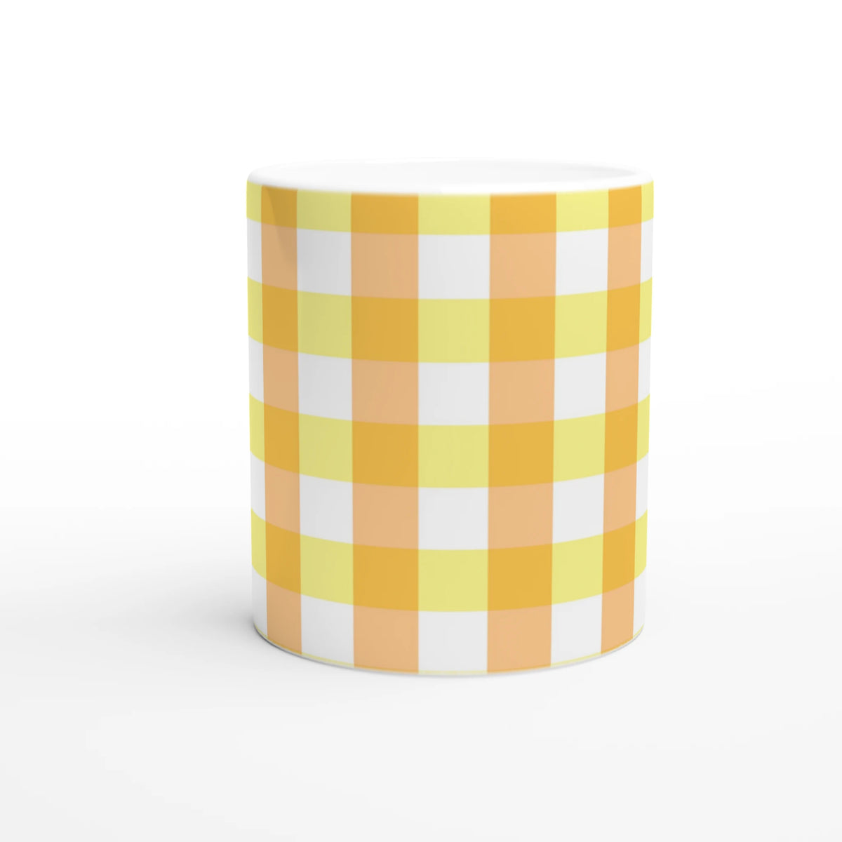 Yellow gingham ceramic mug with a cute checkered pattern for coffee or tea.