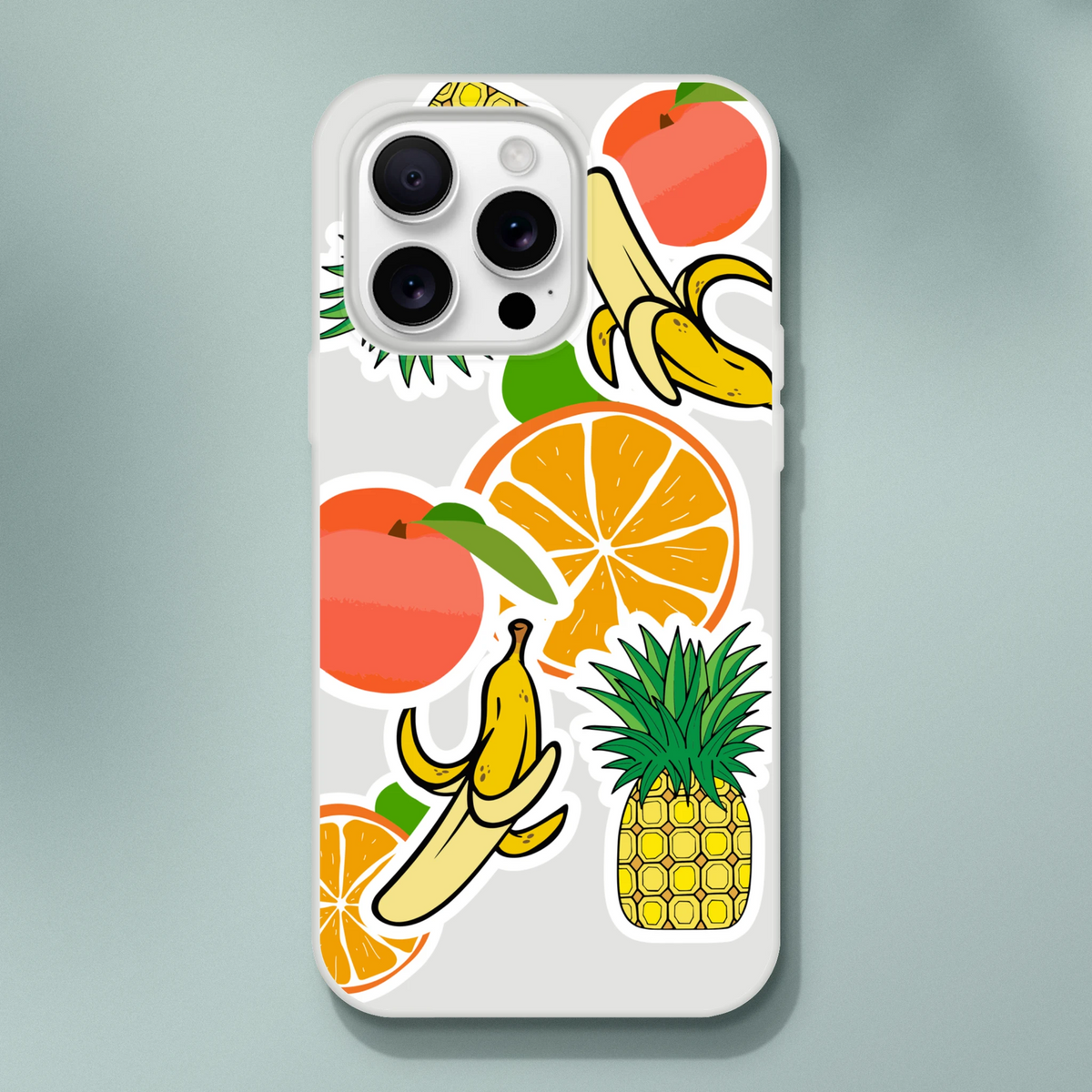 Transparent iPhone case featuring a tropical sticker effect design with bold orange, banana, and pineapple graphics.