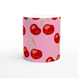 Cute cherry mug in pink coquette aesthetic with red cherry pattern on ceramic.
