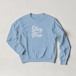 Light blue Stay True sweatshirt for women with white script text, cozy casual top.