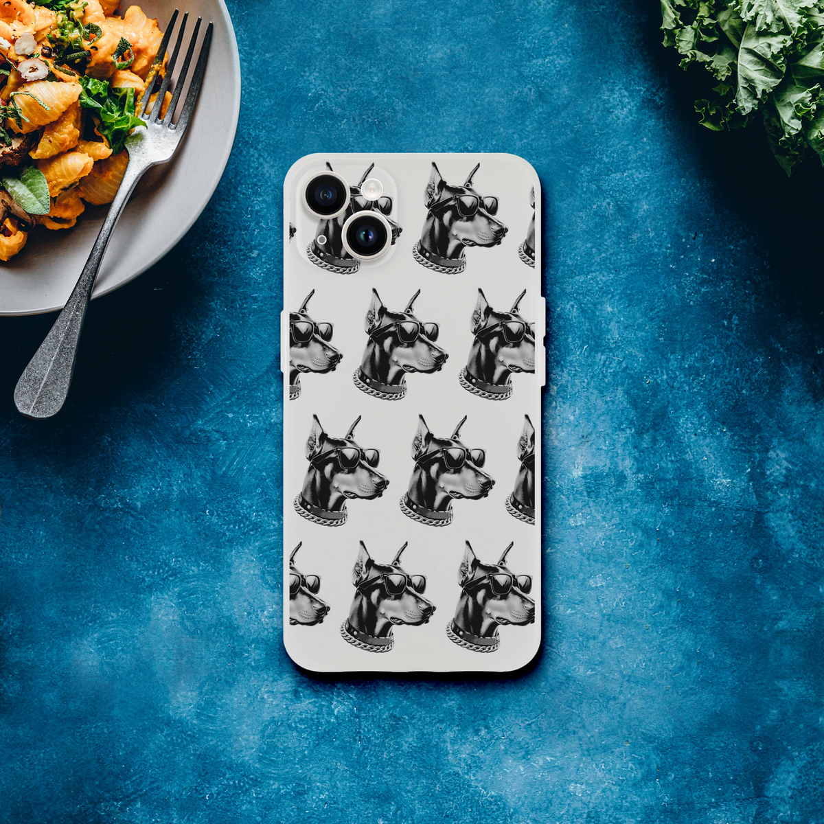 Clear iPhone case featuring a repeating gangster dog head pattern with sunglasses and a chain for iPhone 13-16.