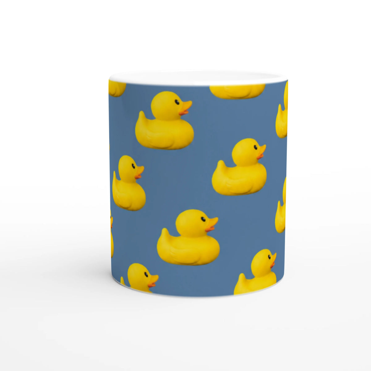 Blue aesthetic ceramic mug featuring a repeating pattern of yellow rubber ducks.
