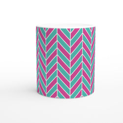Pink and aqua herringbone pattern on glossy ceramic mug. Retro geometric chevron design for coffee or tea.