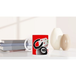 Red ceramic coffee mug featuring lucky casino icons including a horseshoe, dice, playing card, and 8 ball.