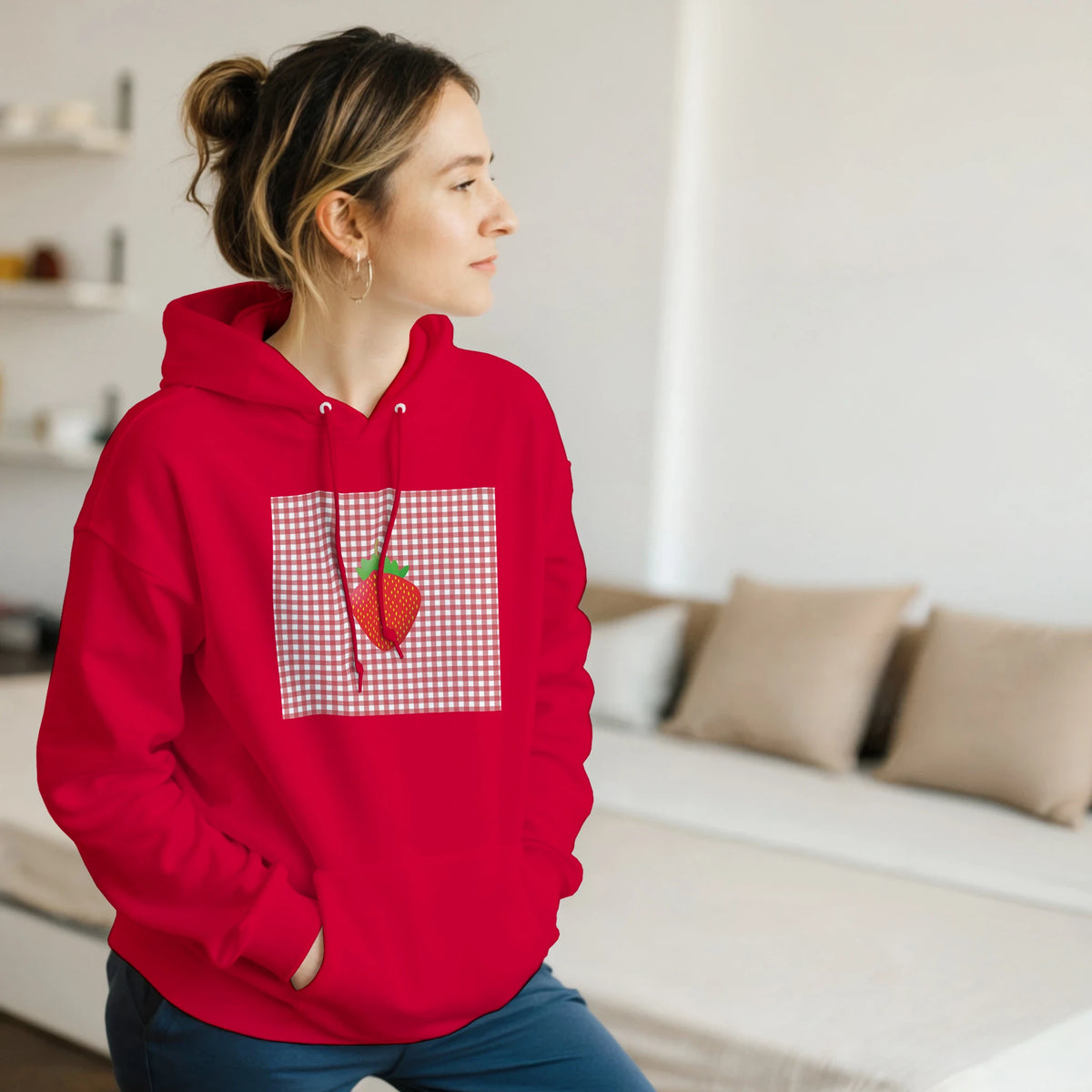 Red vintage fruit graphic pullover featuring a retro strawberry on a gingham background for a nostalgic urban athleisure look.