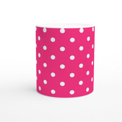 Hot pink ceramic coffee mug with white polka dots, featuring a retro spotty design for daily tea or coffee.