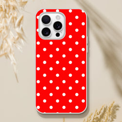 Red and white polka dot retro iPhone case featuring a slim TPU shell with shock absorption for models 13-16.