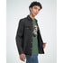 Gothic Gods men's graphic T-shirt in green, soft cotton blend, bold Gothic Gods graphic under a black denim jacket.