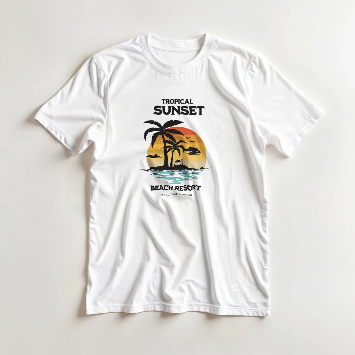 White t-shirt with retro tropical sunset graphic featuring palm trees and "Tropical Sunset Beach Resort" text.