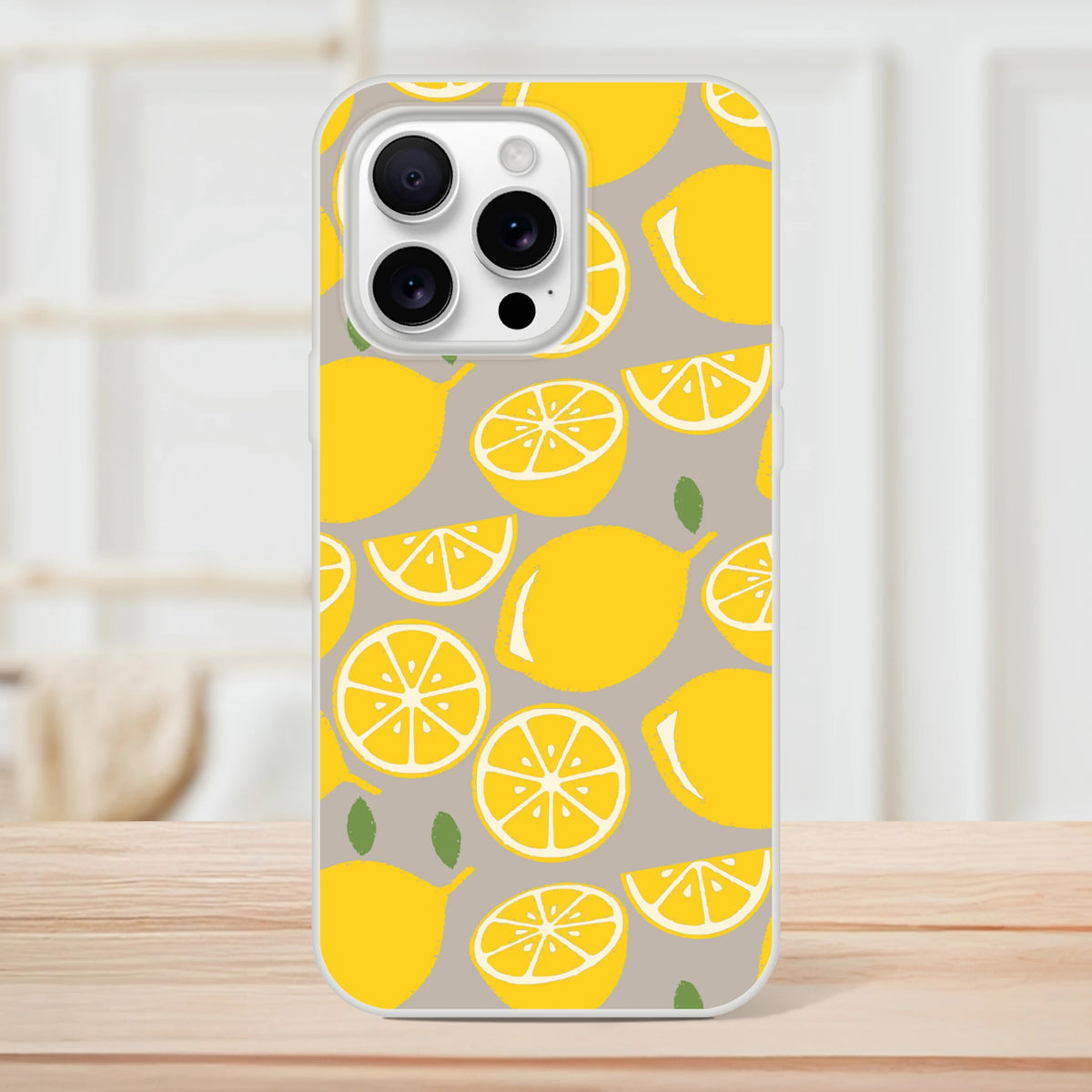 Cute lemon-print iPhone case for 13-16, yellow citrus slices on gray with a smooth matte finish.
