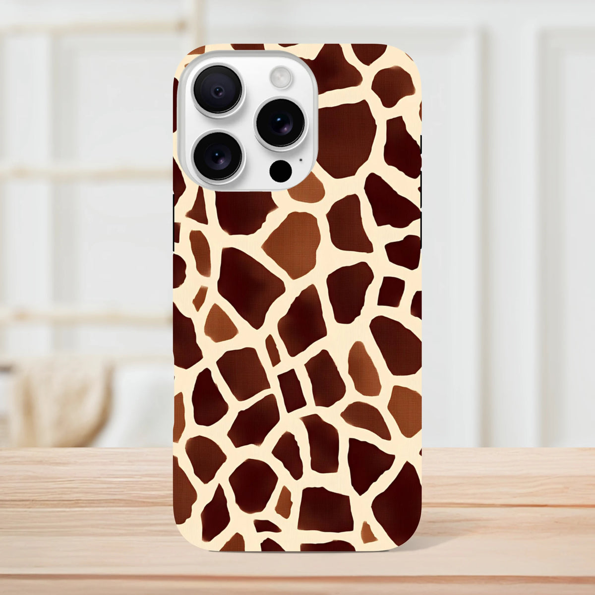 Giraffe print tough iPhone case featuring a bold safari animal pattern. Wild wildlife phone cover designed for comprehensive device protection and stylish streetwear appeal.