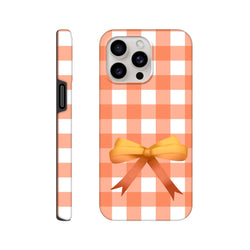 Orange gingham iPhone case with a 3D yellow bow. Cute coquette tough phone cover featuring a bold check pattern and impact-resistant shielding.