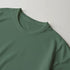 Close-up of a grey-green Gothic Angel men's graphic tee neckline in a soft cotton blend.