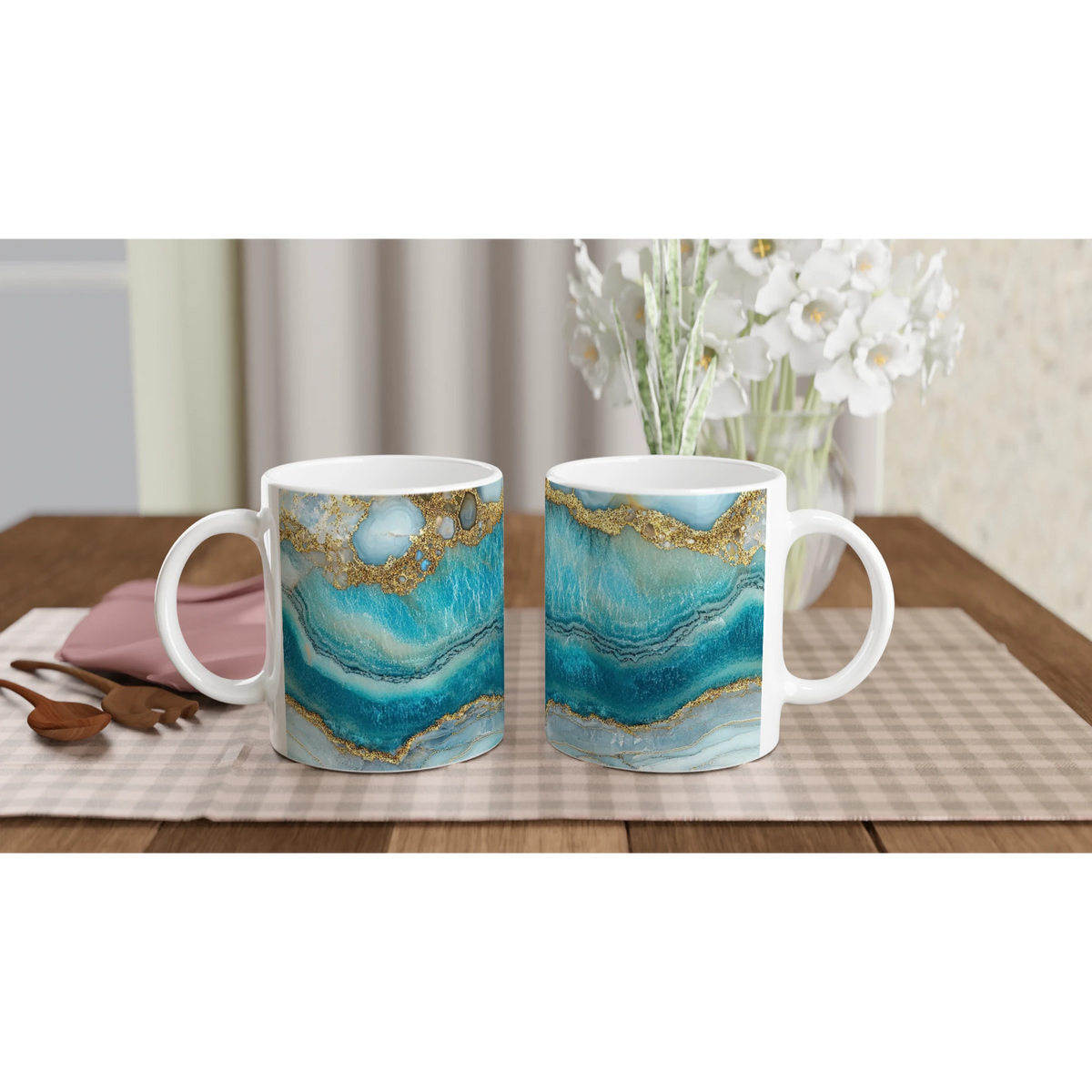 Set of three blue and gold agate mugs with luxury marble-effect ceramic design on a table