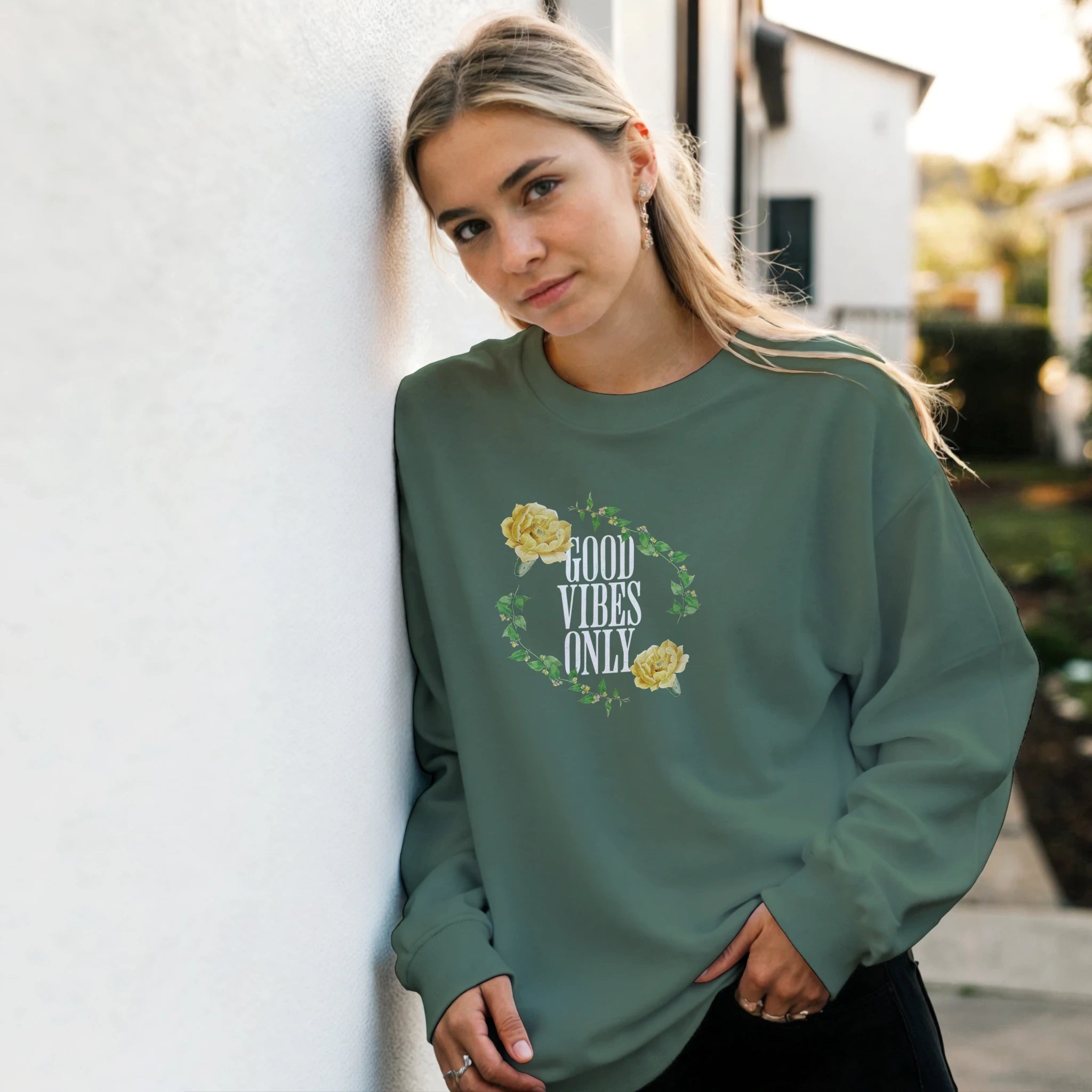 Green women's graphic sweatshirt with floral wreath and Good Vibes Only text, soft cotton blend.
