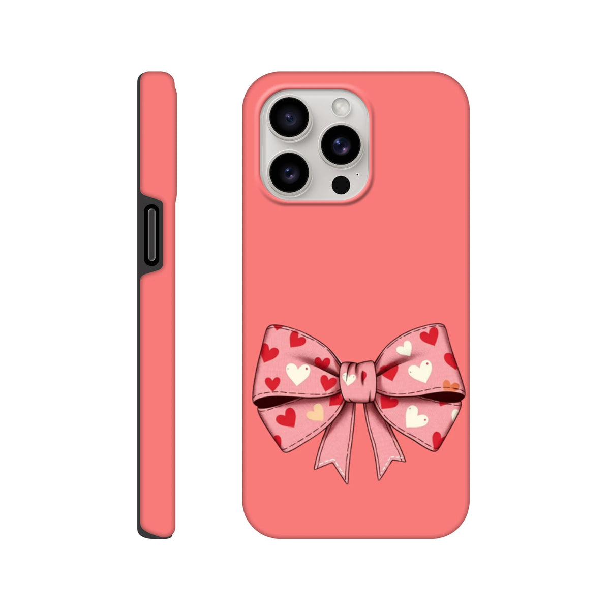 Pink iPhone case featuring a large bow with red, white, and yellow hearts on a coral background. Cute coquette tough phone cover.