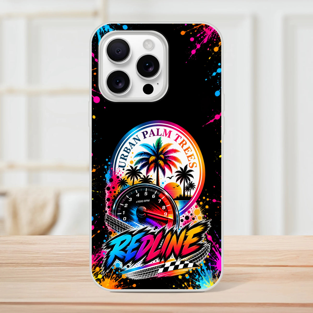 Redline car culture iPhone case featuring colorful Urban Palm Trees RPM gauge, neon splatters, and retro checkered racing flag design.