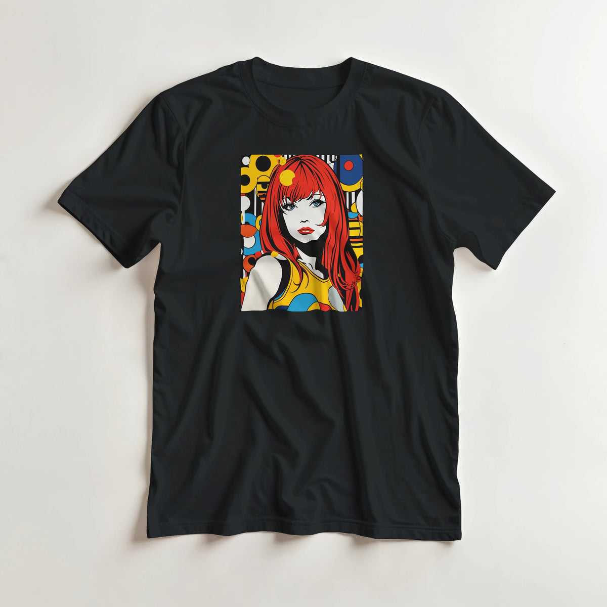Black t-shirt featuring a colourful 70s retro pop art girl print with red hair and bold geometric shapes.