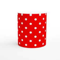 Red ceramic mug featuring bold white polka dots. Cute spotty coffee cup design ideal for daily brews, office use, or gifting.