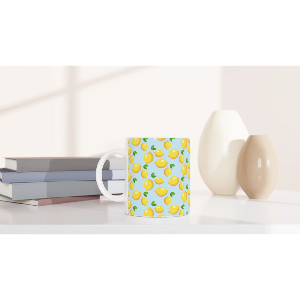 Blue lemon-pattern ceramic mug on a shelf; a cute mini citrus coffee cup.