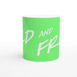 Cute Wild And Free Mug - Slogan Coffee Cup: green ceramic with white cursive slogan.