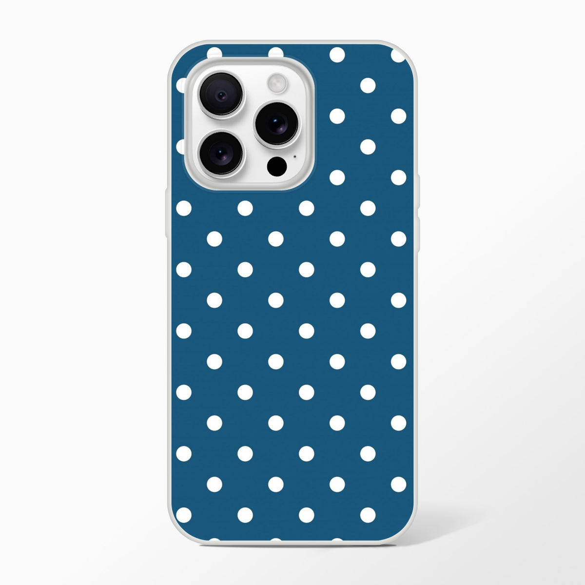 Retro navy blue iPhone case with white polka dots and white bumper. Vintage polka dot phone cover for iPhone 13-16 models.