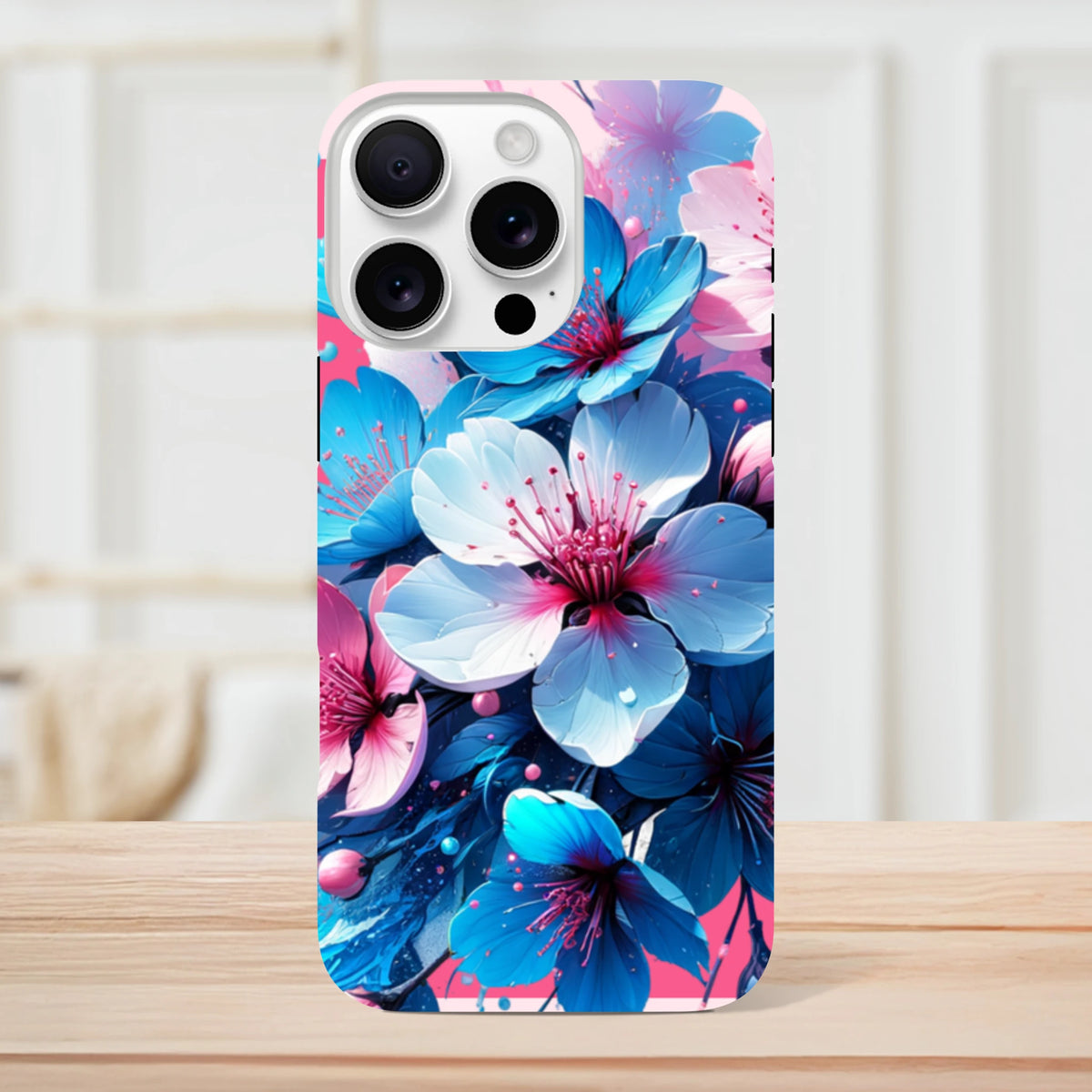 Vibrant blue and pink floral iPhone case design offering tough protection for urban commuters and digital creators.