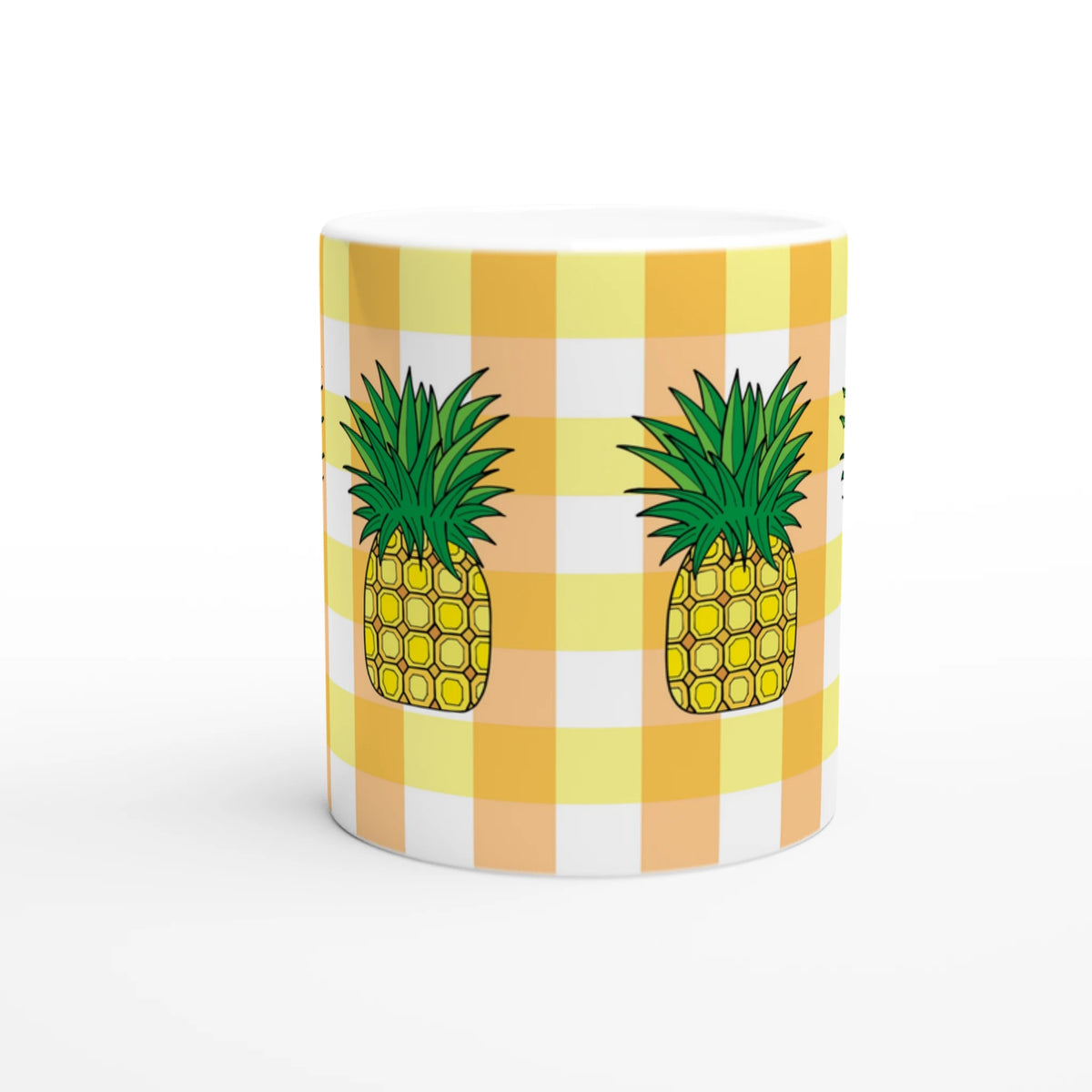 Pineapple-themed yellow gingham coffee mug with pineapple graphics.