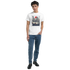 Male model wearing Car T Shirt with JDM graphic on white soft heavyweight cotton, classic fit with cityscape car print.