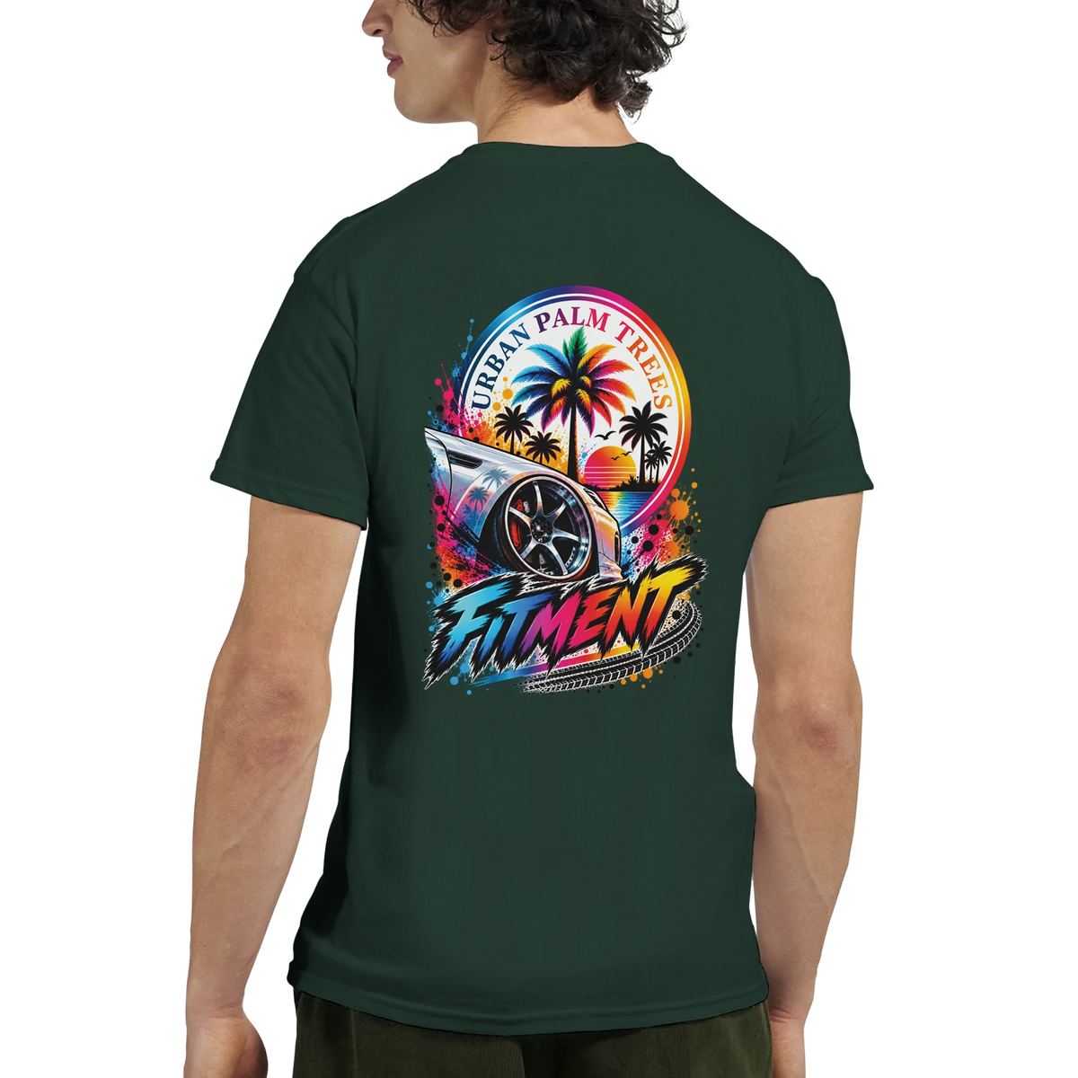 Dark green men's t-shirt with colorful back graphic of modified car wheel, palm trees, and "Fitment" text.